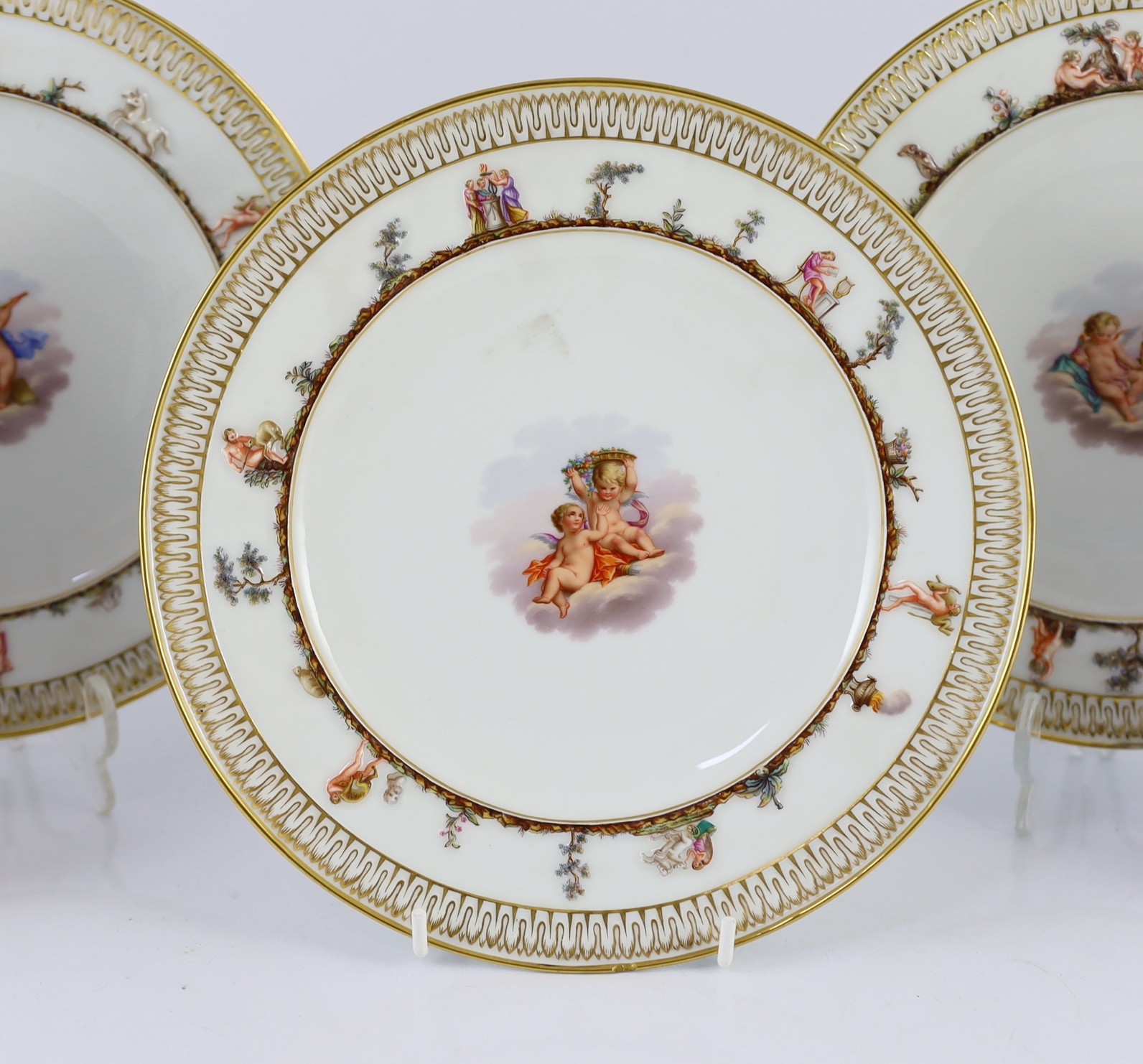 A set of five Meissen Capo di Monte style plates, 19th century, 22.7cm diameter, slight faults